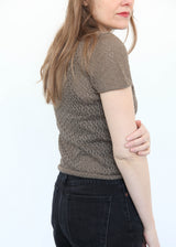 pointelle baby tee lauren manoogian. woman turning to look over her shoulder