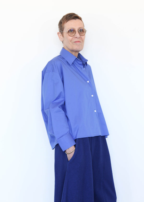 woman in blue shirt and pants