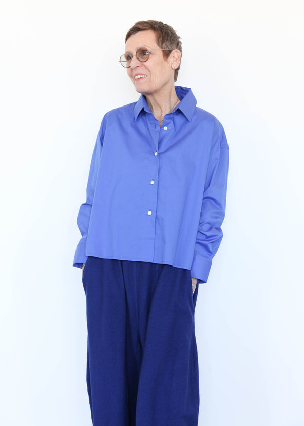 woman in blue shirt and pants